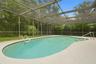Screened enclosed pool area.