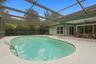 Screened enclosed pool area.