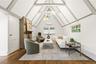 Living Room with Vaulted Ceiling & Fireplace