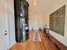 1st Floor - Foyer & Pneumatic Elevator