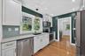 Kitchen With View Of Laundry Room And Back Mudroom