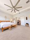 Tray ceiling, multi-blade ceiling fan, and bi-fold closet doors