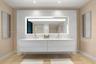 Floating double vanity featuring a stone countertop, dual undermount sinks, full-width backlit mirror, and wood-finish flooring