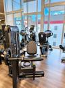 Fitness center featuring floor-to-ceiling windows, wood-finish flooring, and mirrored walls