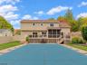 Rear Of Home Overlooking Pool