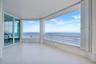 An impressive 1,600 square feet of imported European porcelain-clad terraces wrap gracefully around the entire penthouse, extending from every floor-t