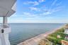 By day, brilliant turquoise ocean views fill the residence with light. By evening, the floor-to-ceiling glass captures the golden glow of sunset as th