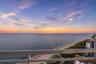 Burnt orange & Blush sunsets blend the experience of indoors and out, allowing breathtaking sunsets, shimmering waterways and the illuminated South Fl