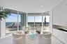 Nearly every room opens to spectacular outdoor living, where expansive wraparound balconies provide a front-row seat to sunrise over the Atlantic and 