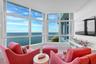 Nestled within The Rosewood guest room, this enchanting private lounge occupies the front bay of the penthouse, where floor-to-ceiling glass surrounds