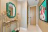 A Secret Passage of Tropical Elegance — Tucked discreetly beside the grand gallery foyer, this enchanting private hallway feels like a hidden jewel wi