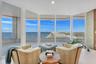 A Private Sanctuary Above the Atlantic — Nestled within the primary suite, this serene sitting room feels suspended between sea and sky. Dramatic floo