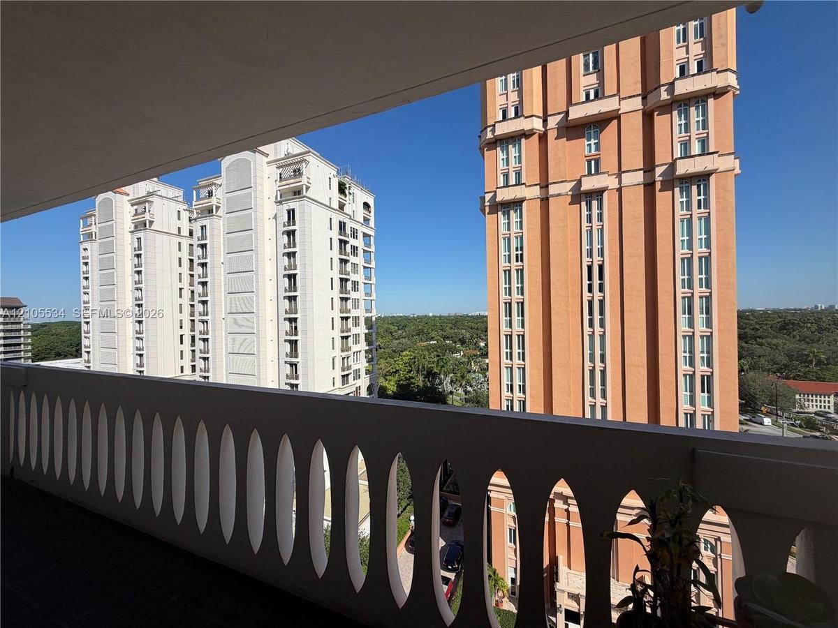 High-rise towers featuring articulated masonry facades, symmetrical fenestration, integrated balconies, and multi-story architectural detailing