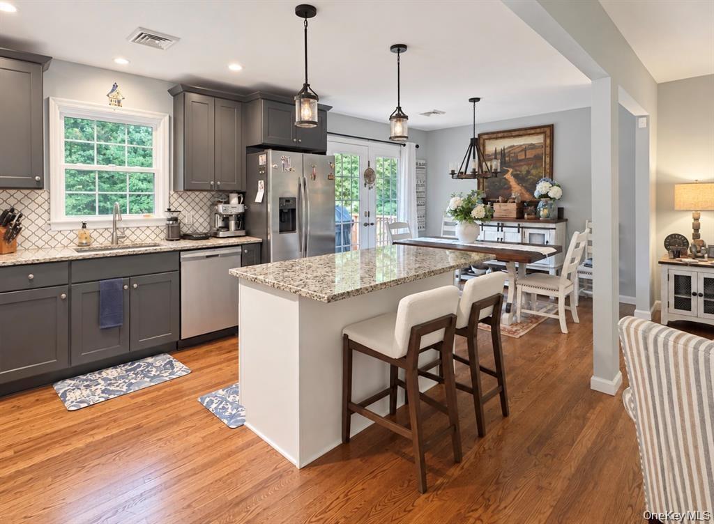 Granite Island and counters with custom pull out drawers.