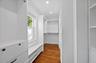 Primary Walk-In Closet Outfitted