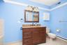 Primary Bathroom has a sink with vanity