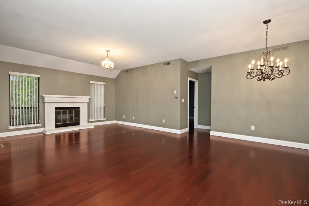 Living Room has a fireplace with mantle