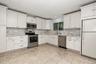Kitchen has stainless appliances