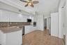 Bright Kitchen With Cabinetry