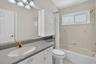Full Bathroom With Tub Shower
