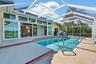 Expansive Screened Pool Retreat