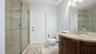 Spacious full bathroom featuring modern fixtures and finishes.
