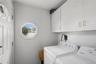 Separate Laundry Room!