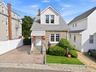 Wonderful size Lot with a spacious Driveway to the Left and another driveway to the Right with a detached 2 Car Garage.
