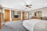 First floor bedroom with wall to wall carpeting.
