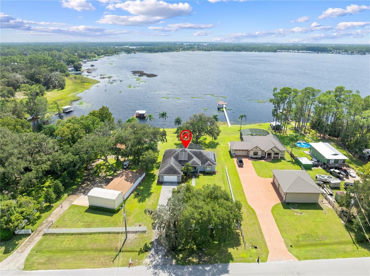 Aerial View of 590 Eden Drive on Lake Center which leads to the chain of lakes