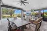 Outdoor lanai area with ample seating room plus outdoor kitchen