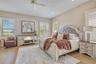 Beautifully appointed master with hardwood flooring, recessed lighting and a ceiling fan for added comfort.