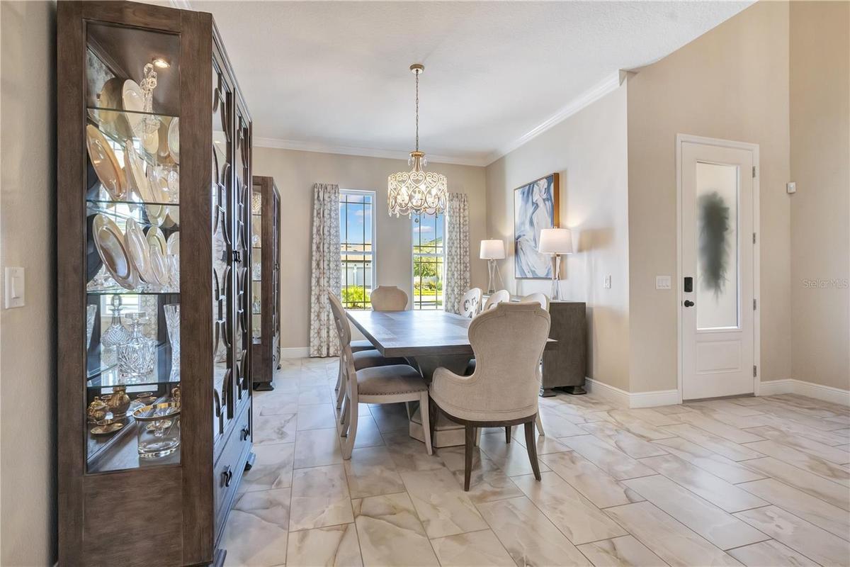Spacious dining area with natural light and convenient access to the adjoining kitchen.