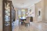 Spacious dining area with natural light and convenient access to the adjoining kitchen.