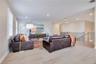 Upstairs gathering space offers generous room for comfortable seating and movie nights.