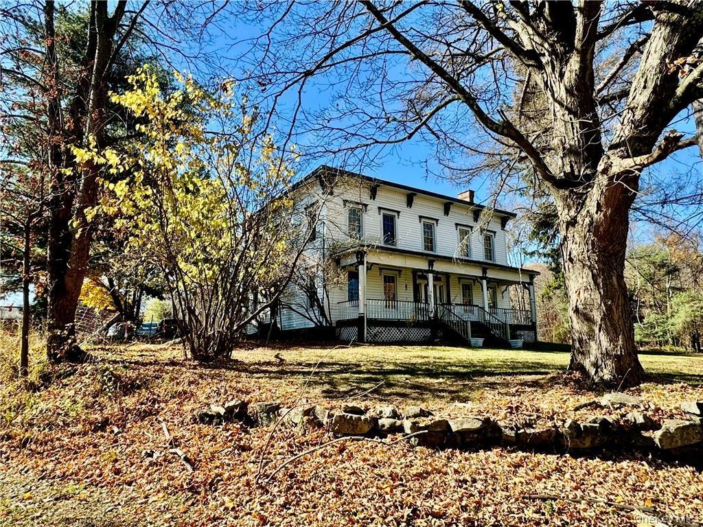 View of front of property with a porch