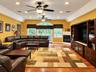 Family Room with wood floors, recessed lighting propane fireplace -
