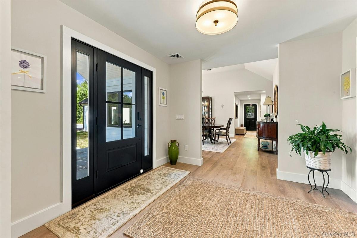 Entry Foyer - Entire House Gutted in 2024 - New Siding, Roof, Doors, Windows, Flooring, Light Fixtures, Appliances...