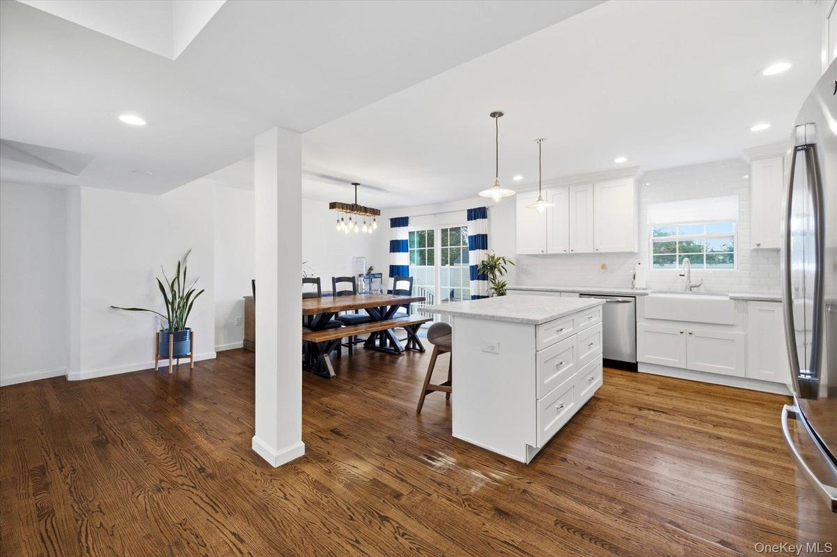 Open-concept kitchen and dining area.