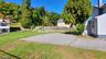 Backyard and driveway