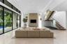 Living Room. Disclaimer: Several photographs presented in this listing contain digitally added furniture, artwork, and decor. These virtually staged i