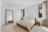 Guest Bedroom. Disclaimer: Several photographs presented in this listing contain digitally added furniture, artwork, and decor. These virtually staged
