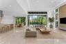 Living Room. Disclaimer: Several photographs presented in this listing contain digitally added furniture, artwork, and decor. These virtually staged i