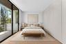 Guest Bedroom. Disclaimer: Several photographs presented in this listing contain digitally added furniture, artwork, and decor. These virtually staged