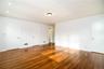 Additional view of large principal suite facing closets and door to ensuite bath.Photos taken when house was empty prior to occupancy.