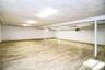 Large open space in basement with access to yard. Photos taken when house was empty prior to occupancy.