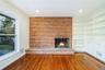 Close up of fireplace and built-ins. Photos taken when house was empty prior to occupancy.