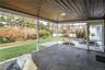 Additional view of covered screened porch. Photos taken when house was empty prior to occupancy.