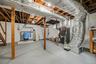 Unfinished basement/Laundry/Utilities