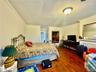 2nd floor Master Bedroom featuring ornamental molding and dark hardwood / wood-style floors